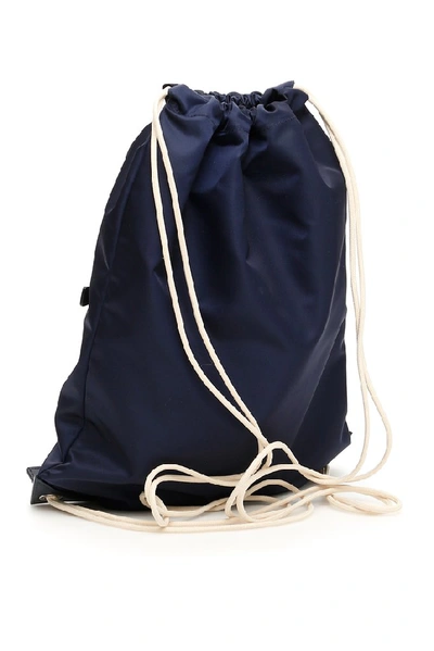 Shop Prada Drawstring Zipped Backpack In Blue