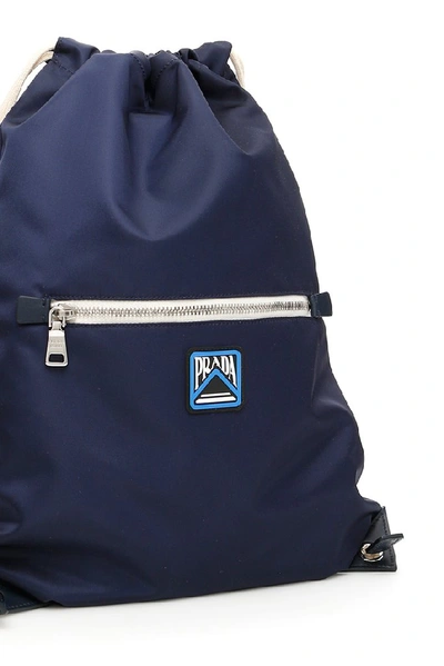 Shop Prada Drawstring Zipped Backpack In Blue