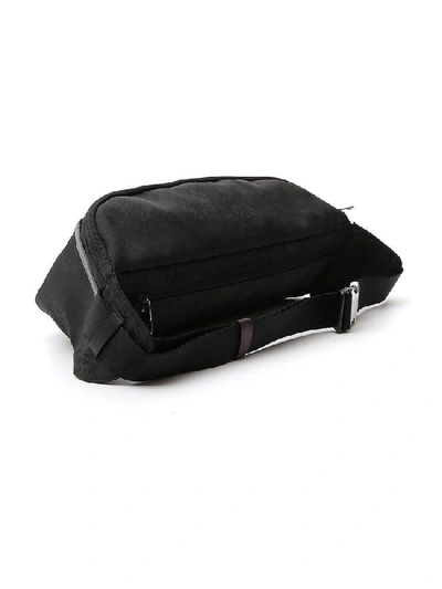 Shop Alexander Mcqueen Embellished Skull Belt Bag In Black