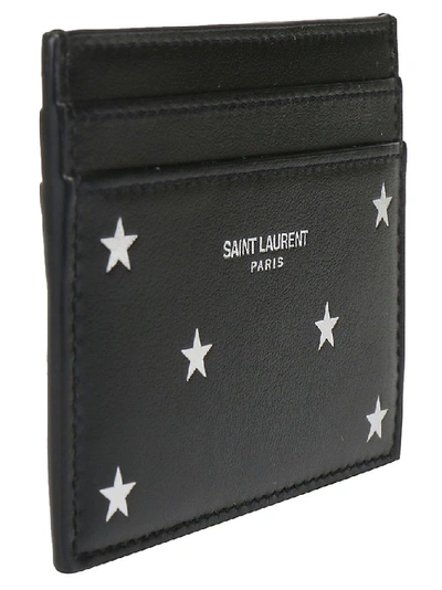 Shop Saint Laurent Star Print Embossed Logo Cardholder In Black