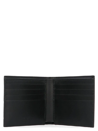 Shop Prada Saffiano Logo Embossed Bifold Wallet In Black