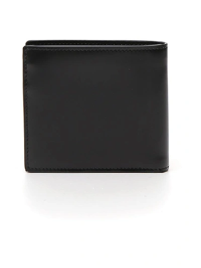Shop Tod's Monogram Plaque Bifold Wallet In Black