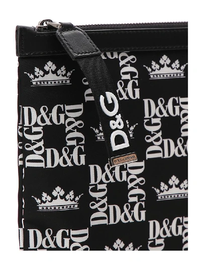 Shop Dolce & Gabbana All Over Logo Print Zipped Pouch In Black