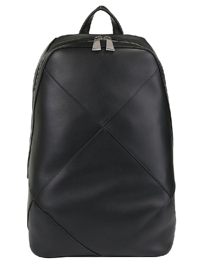 Shop Bottega Veneta Logo Embossed Woven Zipped Backpack In Black