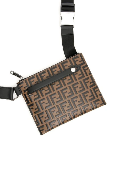 Shop Fendi Embossed Clutch Bag In Brown