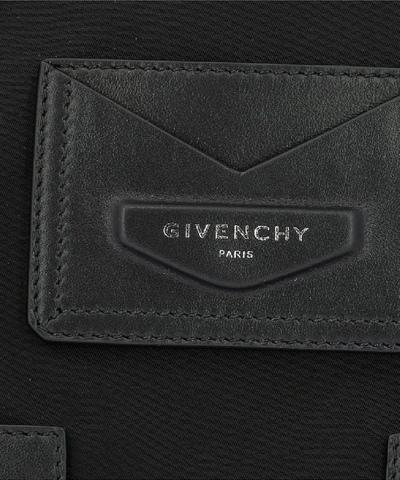 Shop Givenchy Triangle Logo Envelope Backpack In Black