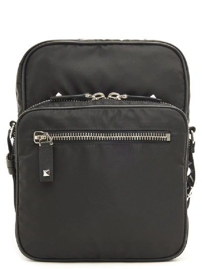 Shop Valentino Vltn Messenger Bag In Black