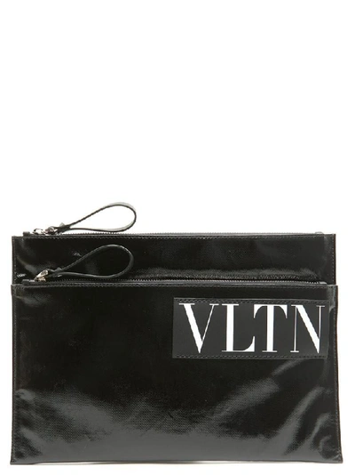 Shop Valentino Garavani Vltn Logo Clutch Bag In Black
