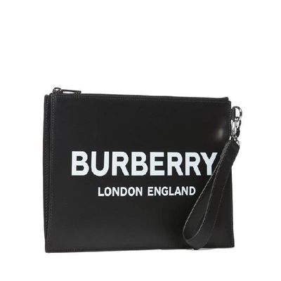 Shop Burberry Logo Print Zip Clutch In Black