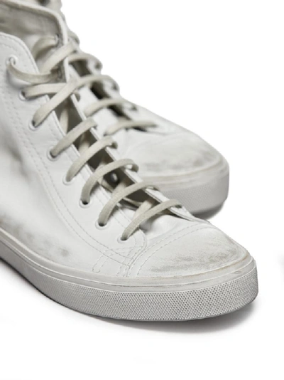 Shop Saint Laurent High Top Trainers In White