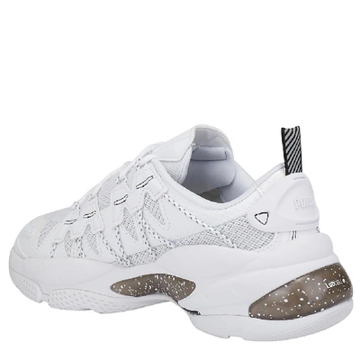 Shop Puma Cell Omega Sneakers In White