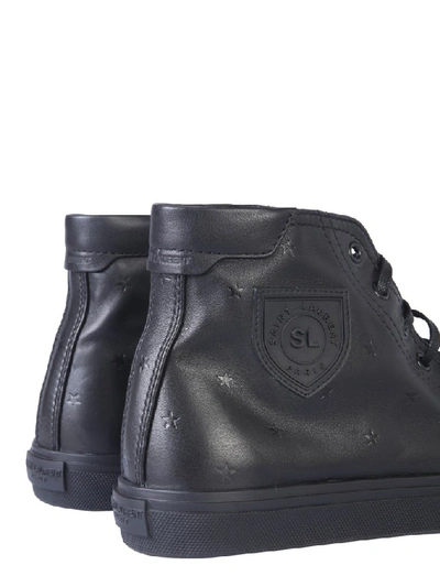 Shop Saint Laurent Star Motif High Top Sneakers In Black