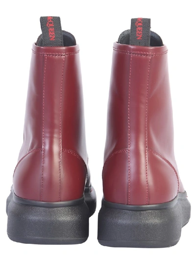 Shop Alexander Mcqueen Oversized Combat Boots In Red