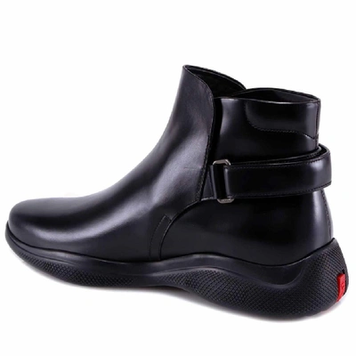 Shop Prada Velcro Strap Detail Ankle Boots In Black