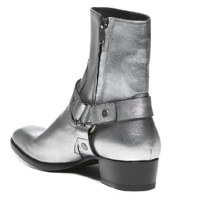 Shop Saint Laurent Wyatt Harness Ankle Boots In Silver