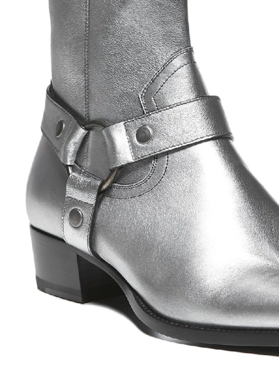 Shop Saint Laurent Wyatt Harness Ankle Boots In Silver