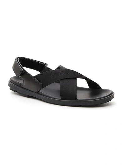 Shop Prada Cross Strap Logo Embossed Sandals In Black