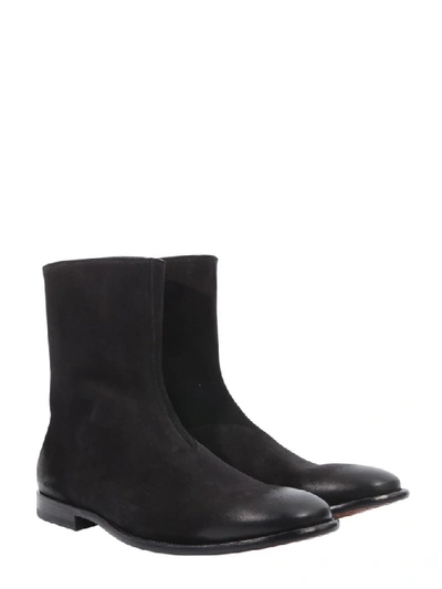 Shop Alexander Mcqueen Distressed Ankle Boots In Black