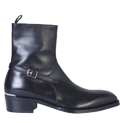 Shop Alexander Mcqueen Strapped Ankle Boots In Black