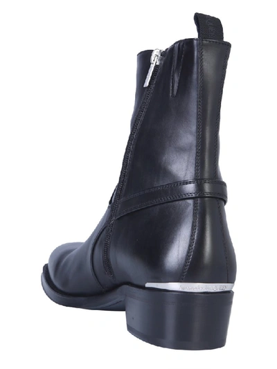 Shop Alexander Mcqueen Strapped Ankle Boots In Black