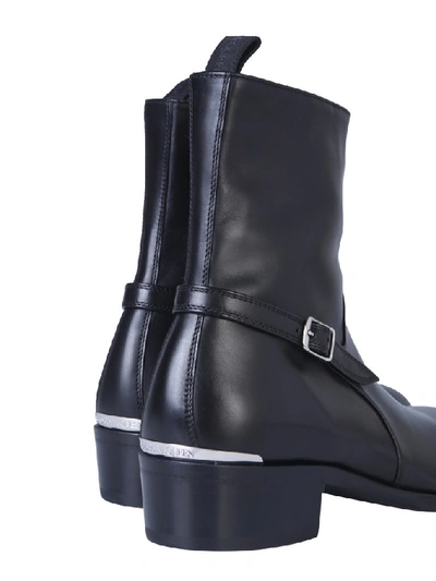 Shop Alexander Mcqueen Strapped Ankle Boots In Black