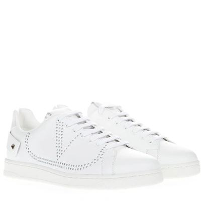 Shop Valentino Garavani Vlogo Studded Sneakers In White