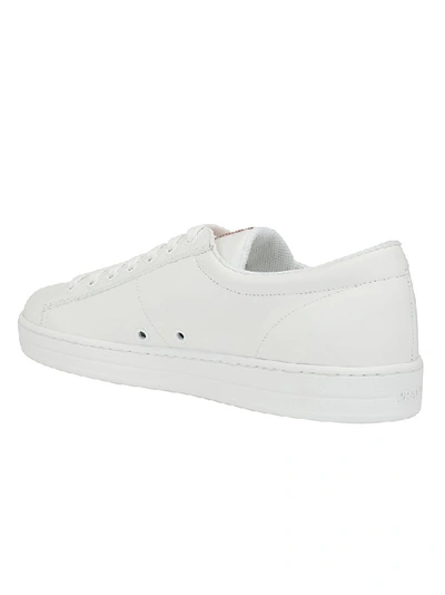 Shop Prada Logo Embossed Sneakers In White