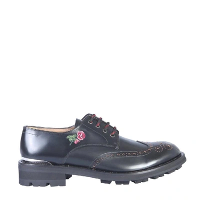 Shop Alexander Mcqueen Floral Detail Brogues In Black