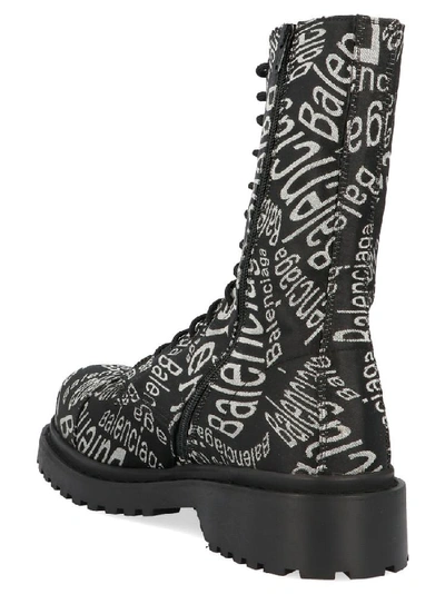 Shop Balenciaga Logo Motif Combat Boots In Black