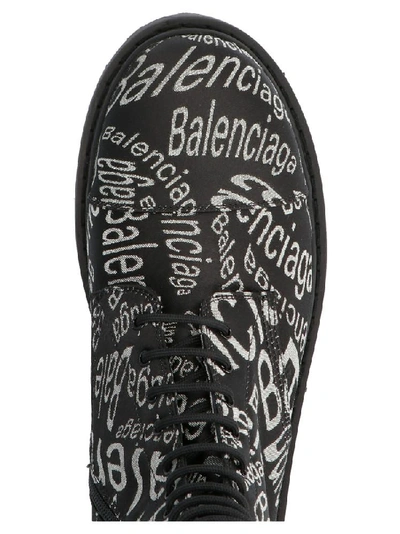 Shop Balenciaga Logo Motif Combat Boots In Black