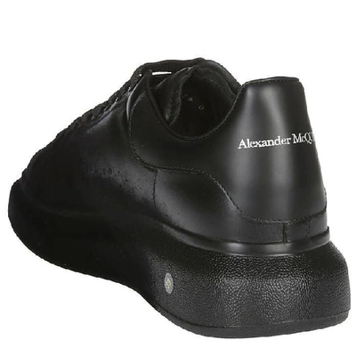 Shop Alexander Mcqueen Spray Painted Oversize Sneakers In Black