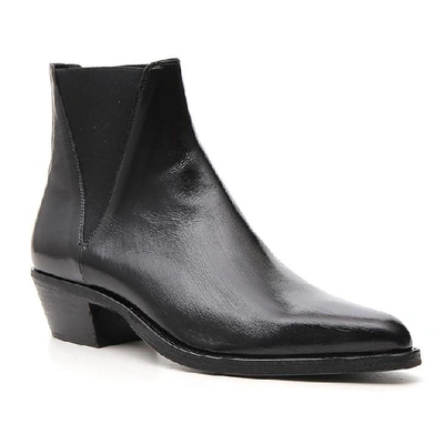 Shop Saint Laurent Dakota Chelsea Ankle Boots In Black
