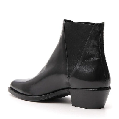 Shop Saint Laurent Dakota Chelsea Ankle Boots In Black