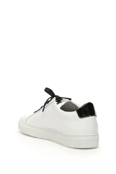 Shop Common Projects Retro Low Glossy Sneakers In White
