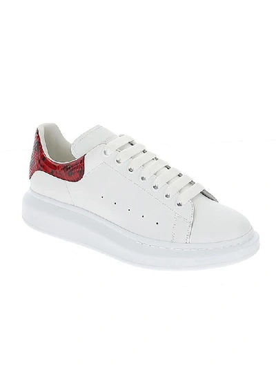 Shop Alexander Mcqueen Embossed Snake Print Oversized Sneakers In White/red