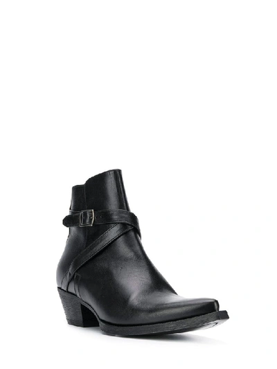 Shop Saint Laurent Wyatt Ankle Boots In Black