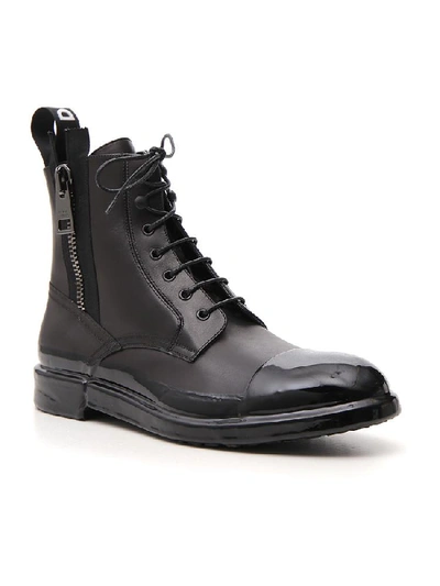 Shop Dolce & Gabbana Lace Up Zipped Ankle Boots In Black