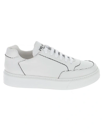 Shop Prada Logo Embossed Panelled Sneakers In White