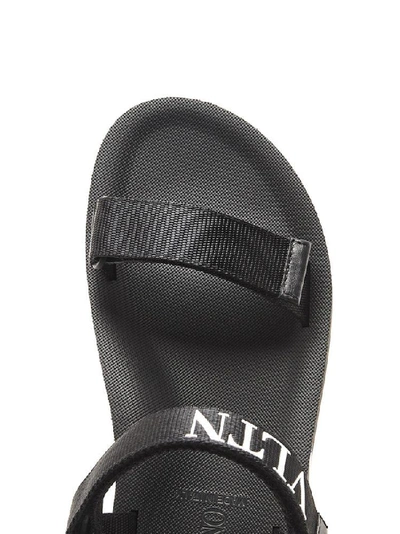 Shop Valentino Vltn Sandals In Black