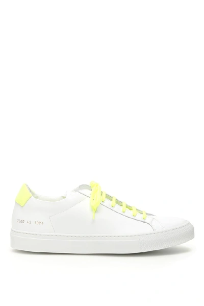 Shop Common Projects Retro Low Top Fluro Sneakers In Yellow