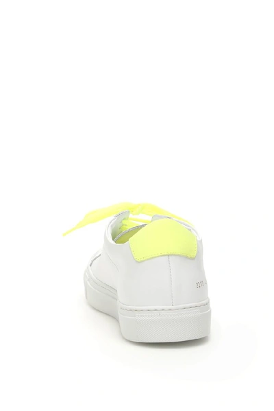 Shop Common Projects Retro Low Top Fluro Sneakers In Yellow