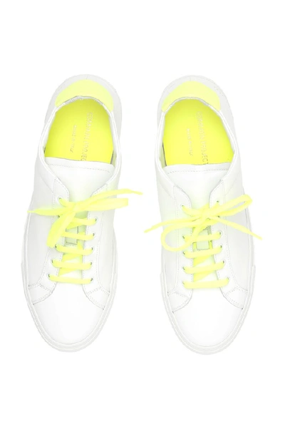 Shop Common Projects Retro Low Top Fluro Sneakers In Yellow