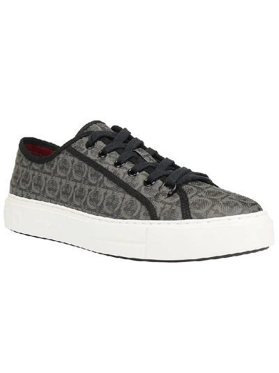Shop Ferragamo Salvatore  Logo Embossed Low Top Sneakers In Grey
