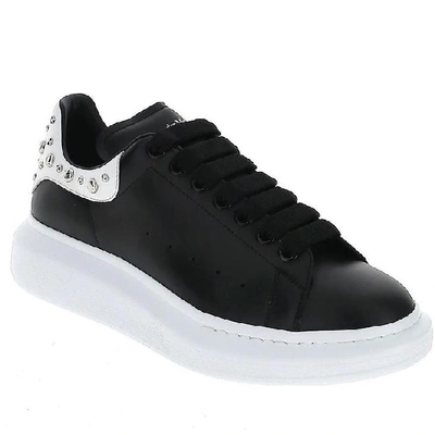 Shop Alexander Mcqueen Studded Oversized Sneakers In Black/white