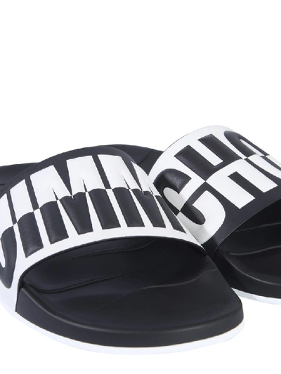 Shop Jimmy Choo Rey Slides In Black