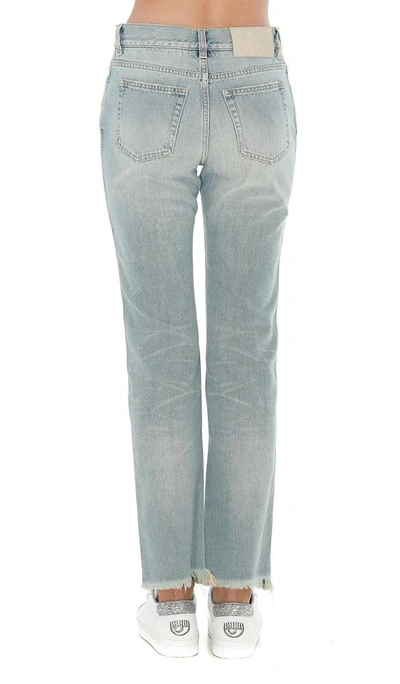 Shop Givenchy Frayed Bootcut Jeans In Blue