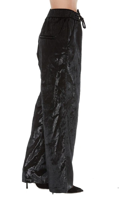 Shop Balmain Metallic Effect Flared Trousers In Black