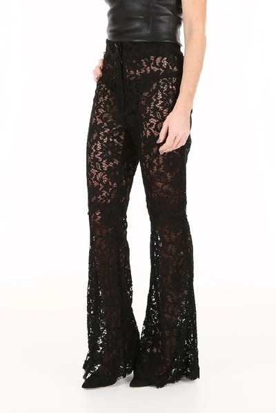 Shop Dolce & Gabbana Lace Flared Pants In Black