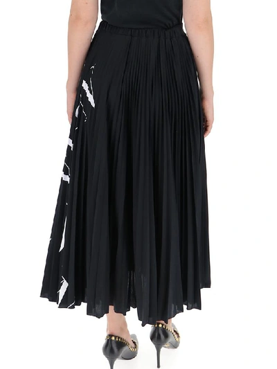 Shop Valentino Logo Print Pleated Skirt In Black