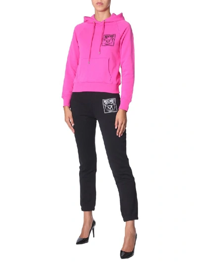 Shop Moschino Teddy Logo Hoodie In Pink